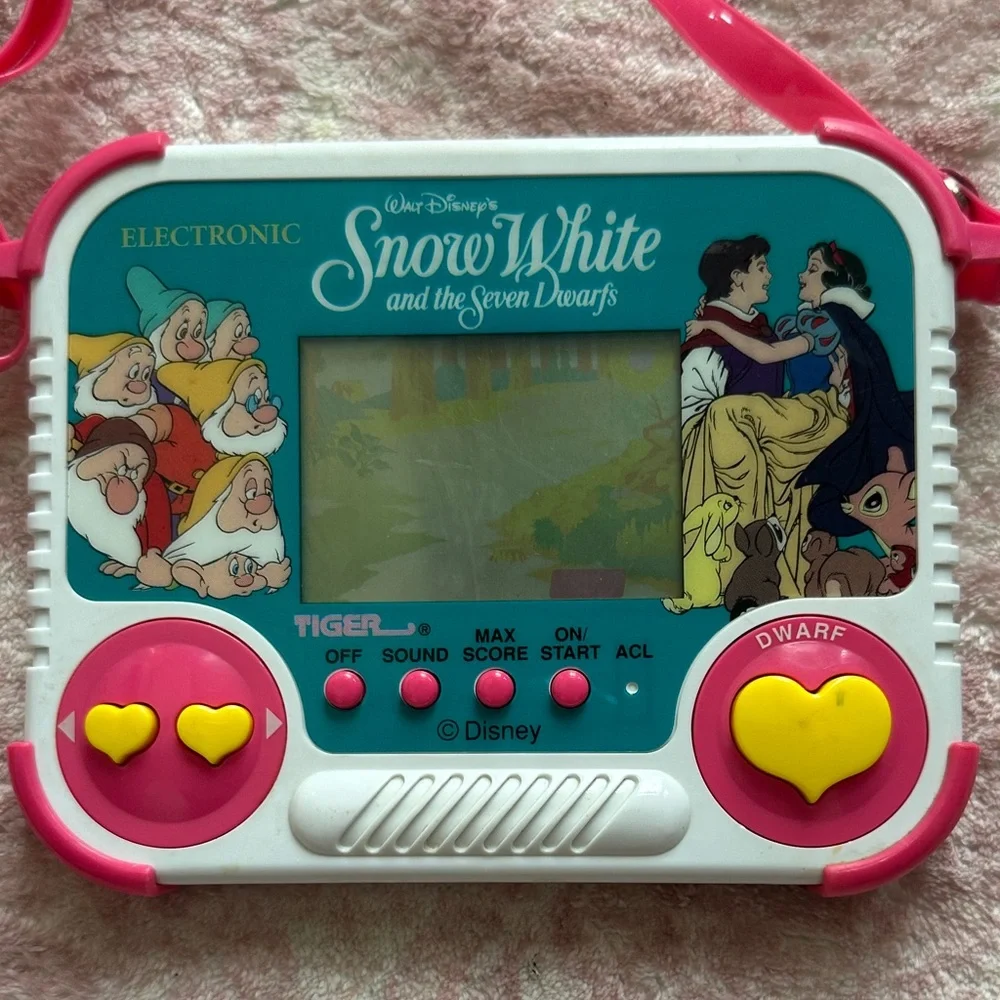 Vintage 1990 Tiger Electronics Snow White Handheld Game with purse strap